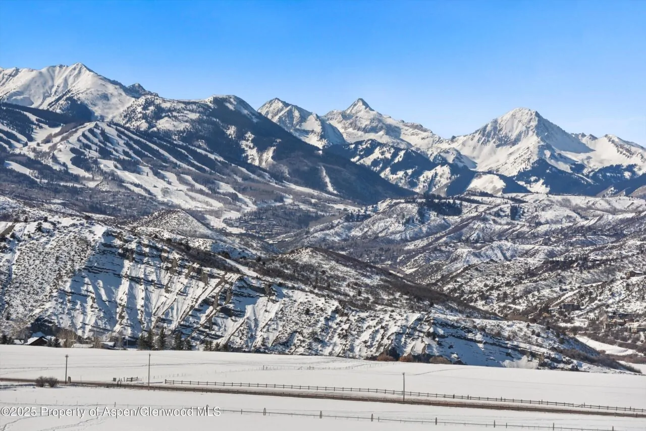 Snowy mountain valley view in Aspen MLS - Mirr Ranch Group