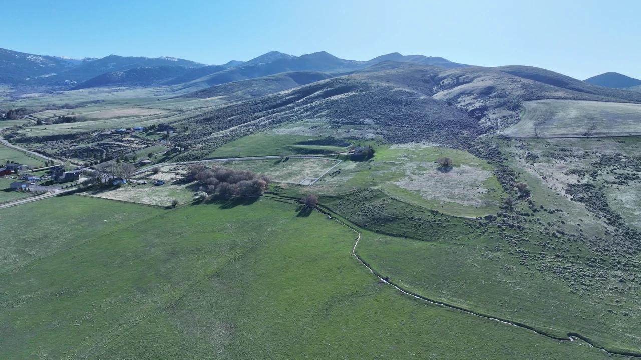 Mirr ranch group photo Hillside view over Cooper Ranch Idaho pastures and terrain