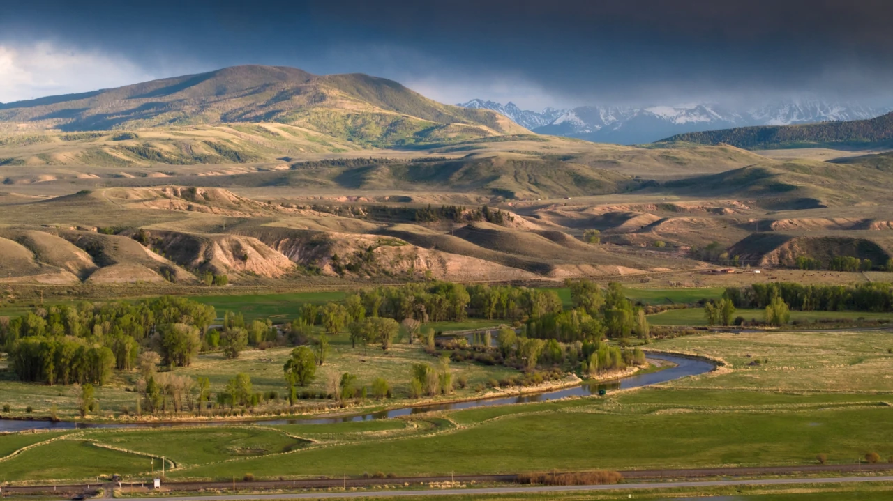 Mirr Ranch Group Photo Reeder Creek Ranch rolling hills, river, and mountain views