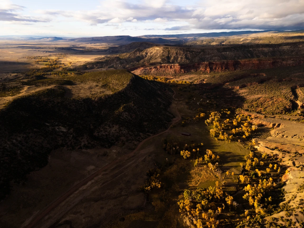 Muddy Mountain Ranch Wyoming valley with golden cottonwoods